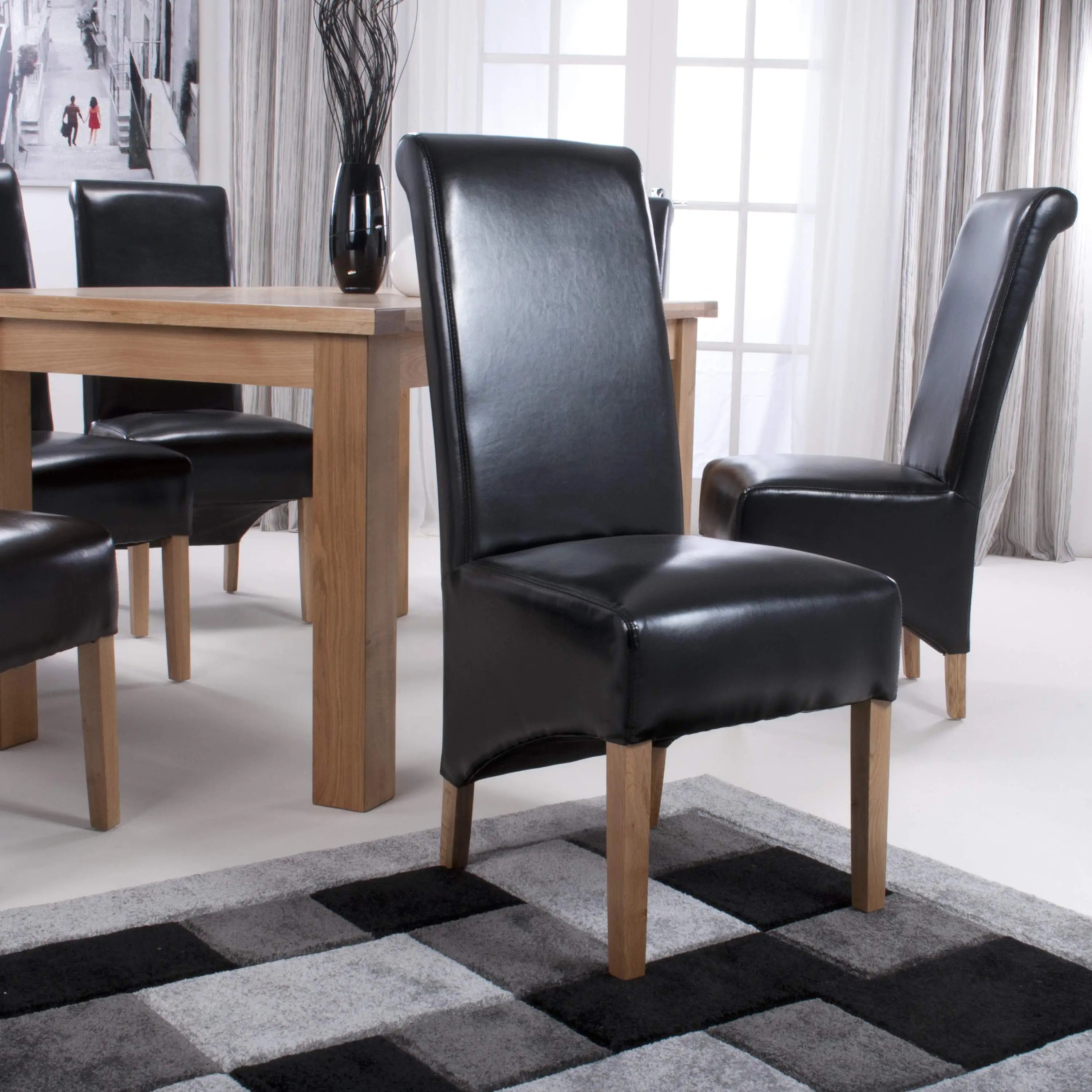 Krista Roll Back Bonded Leather Dining Chair